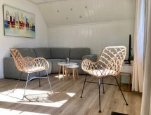 Grachthaus: Vrijstaande bungalow aan het Lauwersmeer met tuin en golfbaan - thumbnail 5