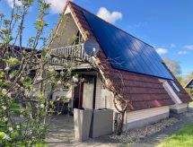 Vrijstaande bungalow met tuin op golfresort bij Lauwersmeer - thumbnail 1