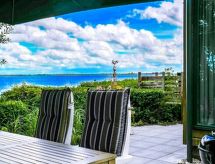 Vrijstaande bungalow aan het Lauwersmeer met haard en grote tuin - thumbnail 5