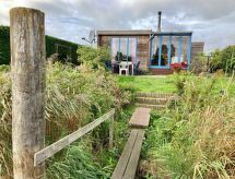 Casa Rosa: Knusse bungalow aan het Lauwersmeer met haard en tuin - thumbnail 1