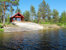 Houten huis Risdalbu direct aan meer in Mykland, Noorwegen - thumbnail 1