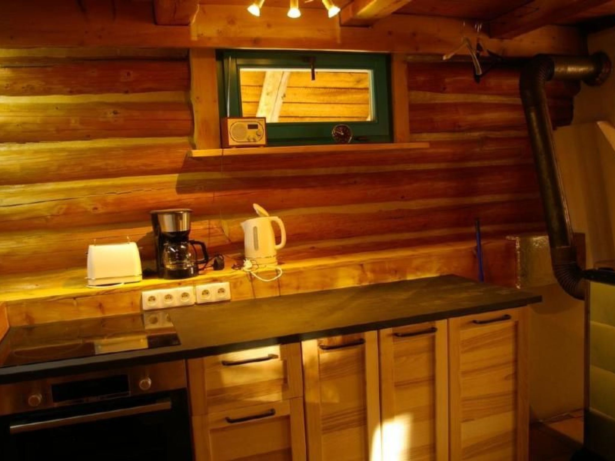 Blockhaus in Gajówka mit Kaminofen-Inside