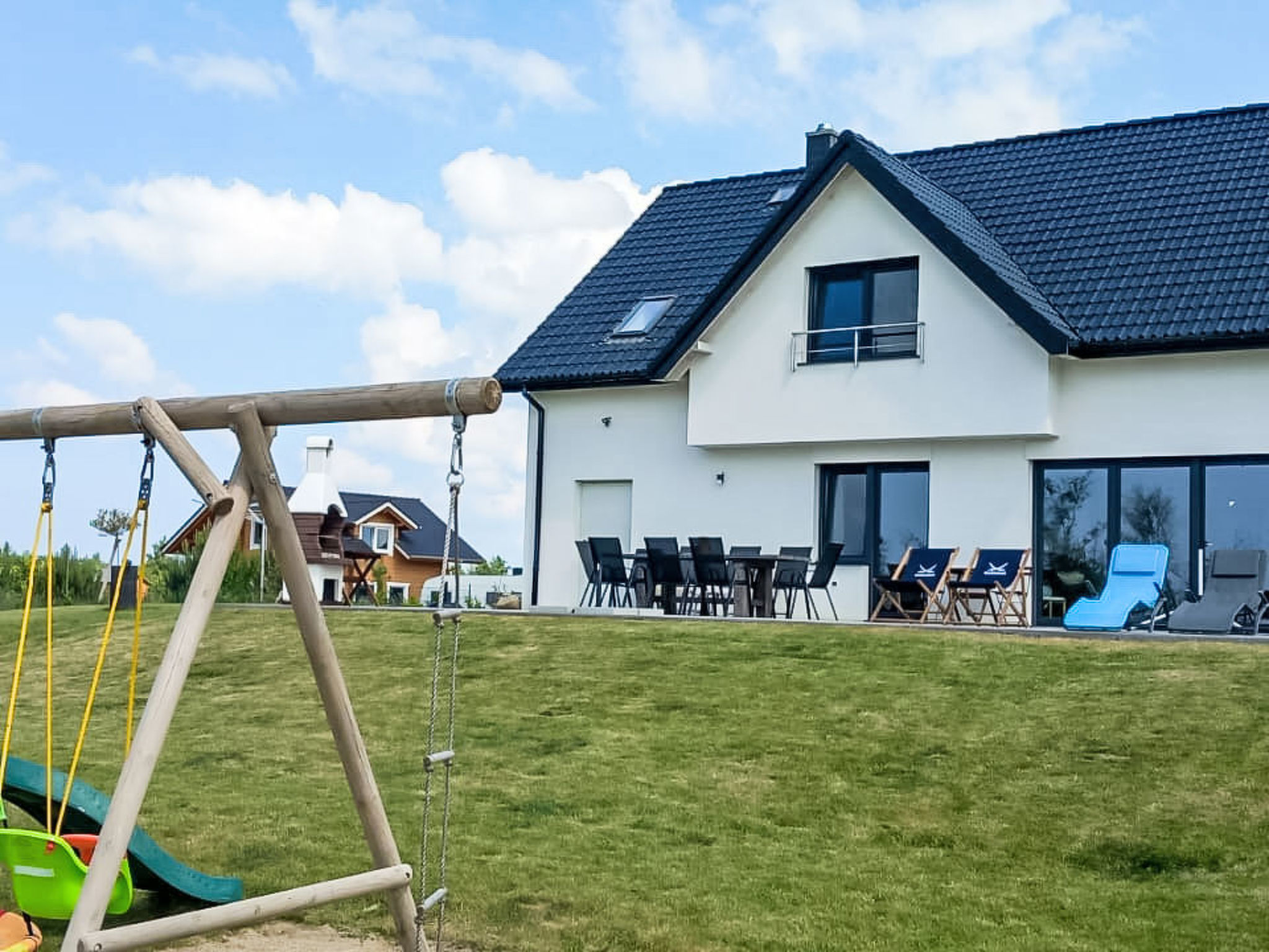 Ferienvilla "Villa Koprowo" mit Jacuzzi und Sauna - Buiten