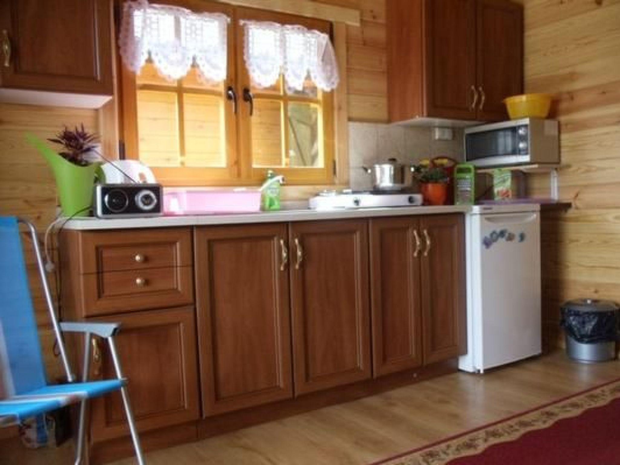 Gemütliches Holzferienhaus mit Grill und Garten-Inside