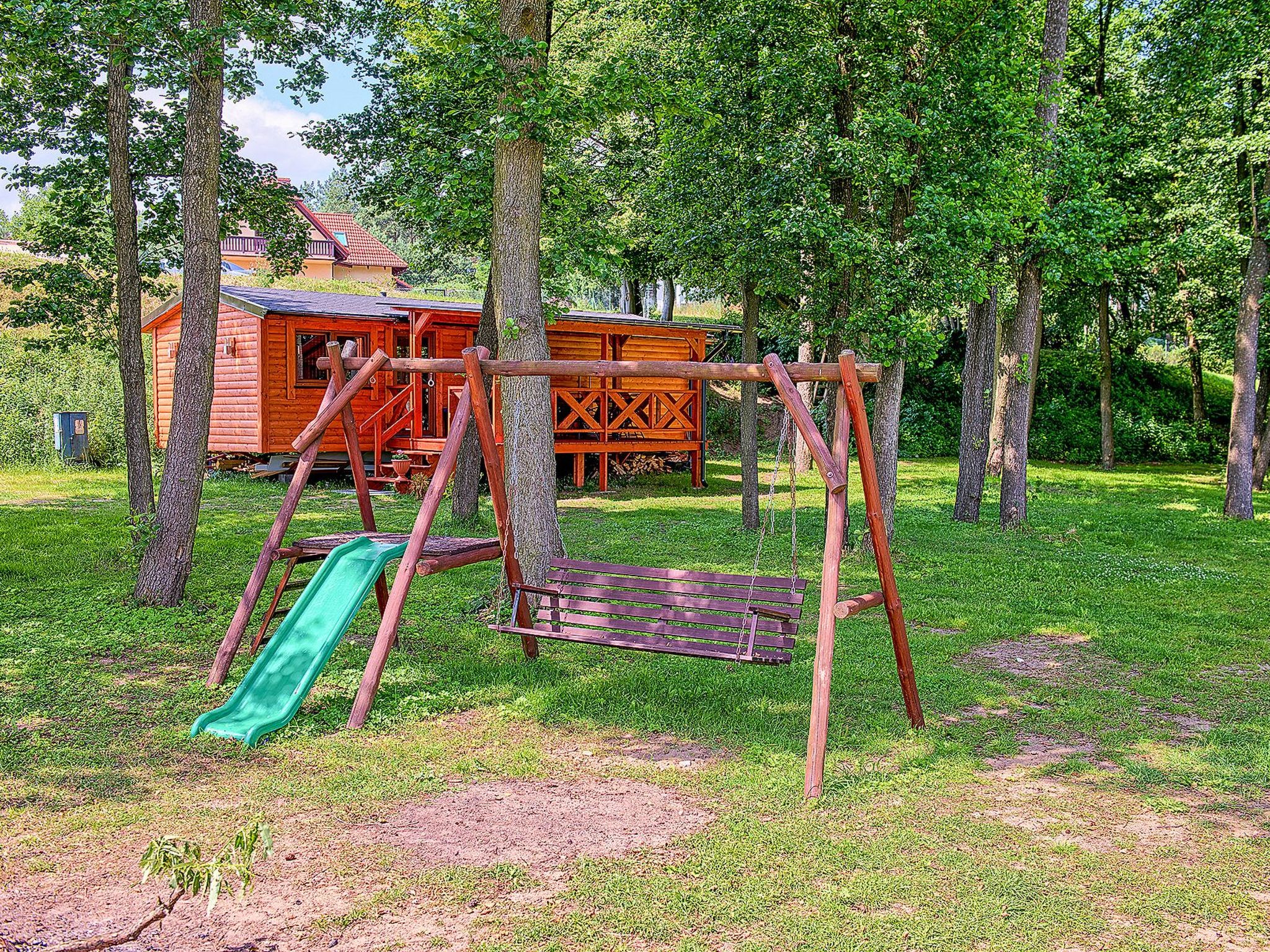 HOLZHÄUSCHEN AM RADUŃSKI SEE-Buiten