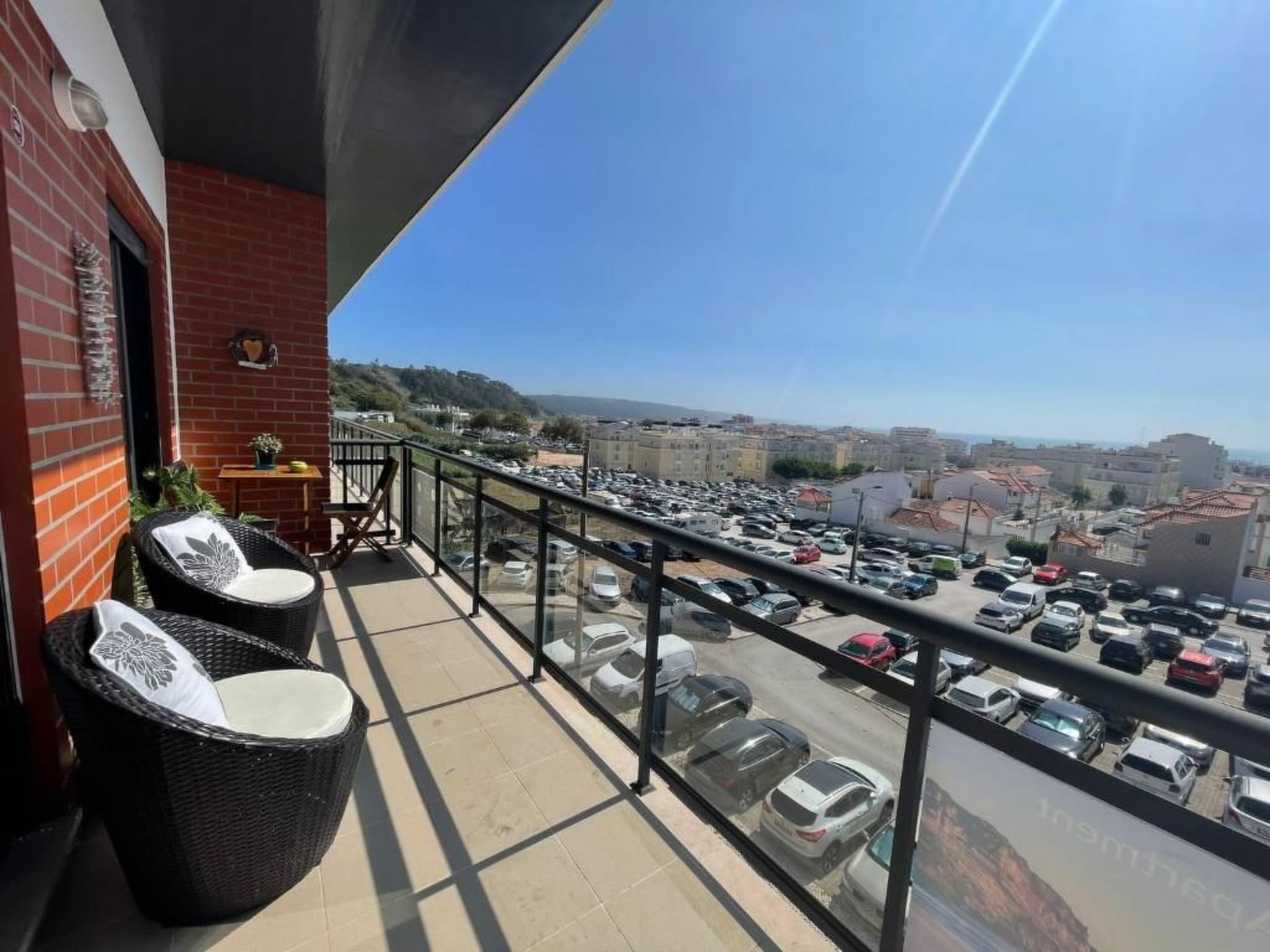 Genießen Sie den Balkon mit Blick auf das Meer-Dedans