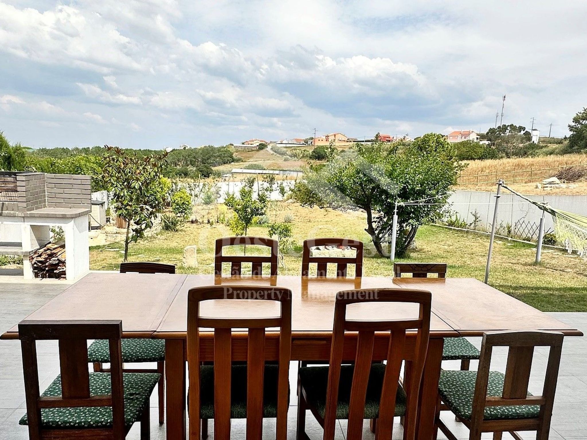 Magnolienhaus-Dehors