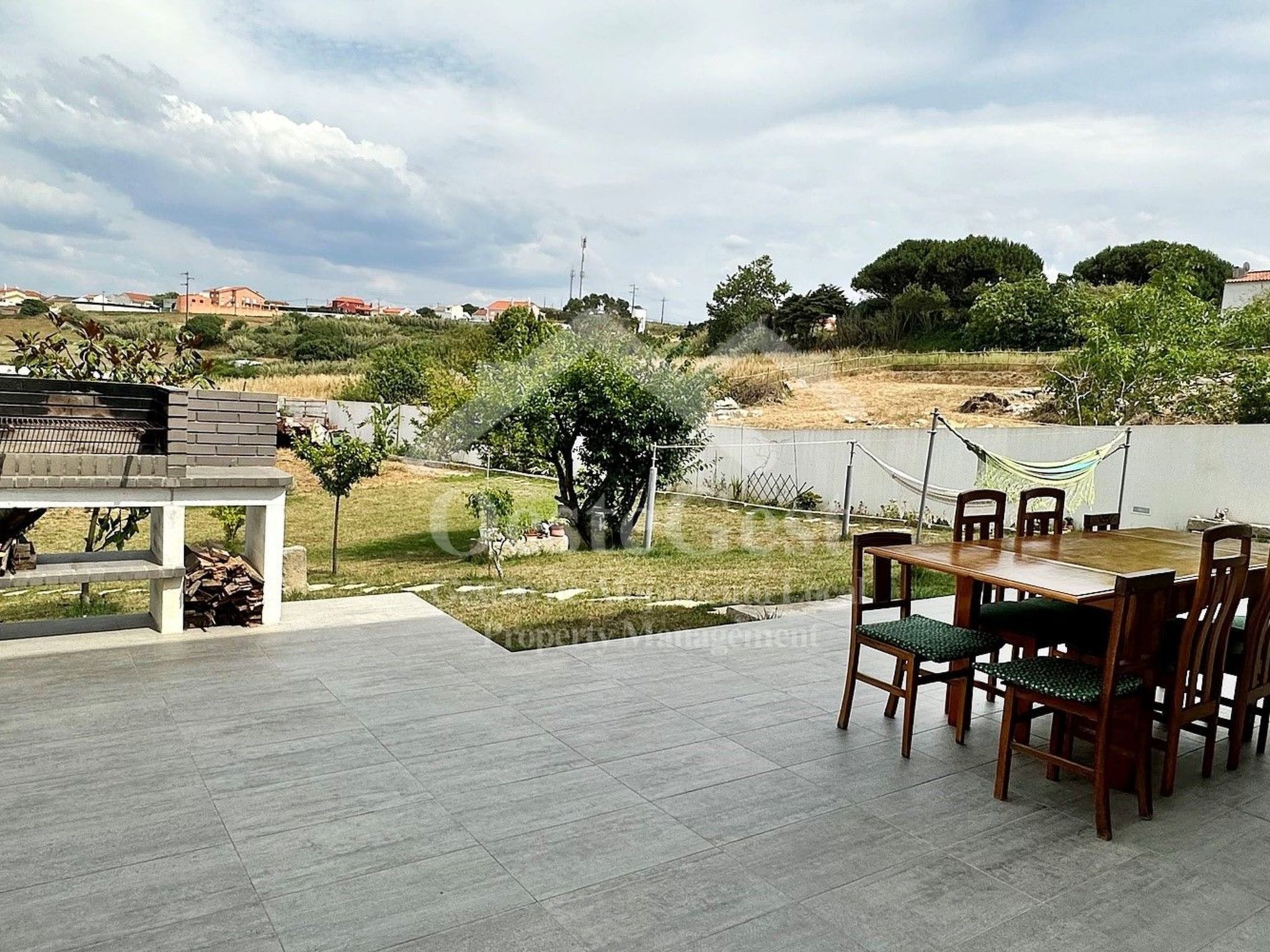 Magnolienhaus-Dehors