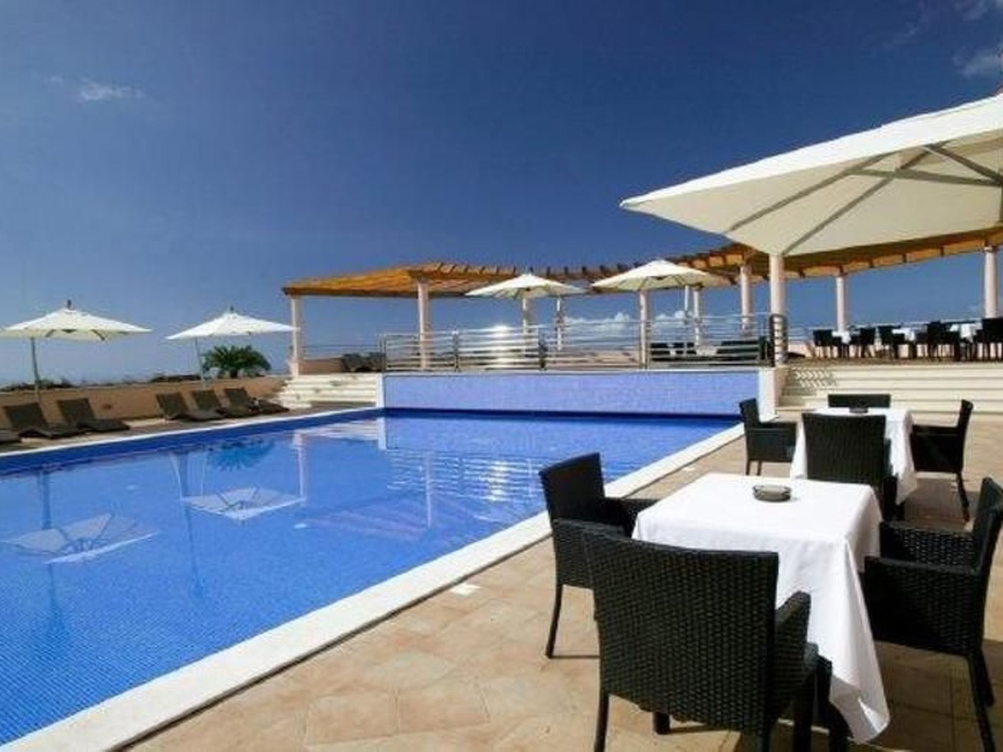 Photo of Elegante Ferienwohnung mit Gemeinschaftspool und Wellnessbereich