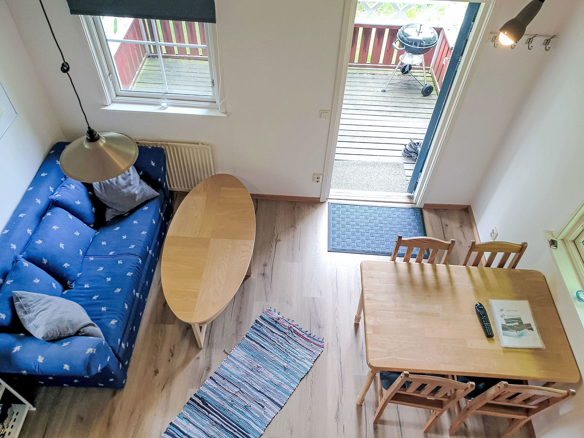 Holzhaus mit überdachter Terrasse