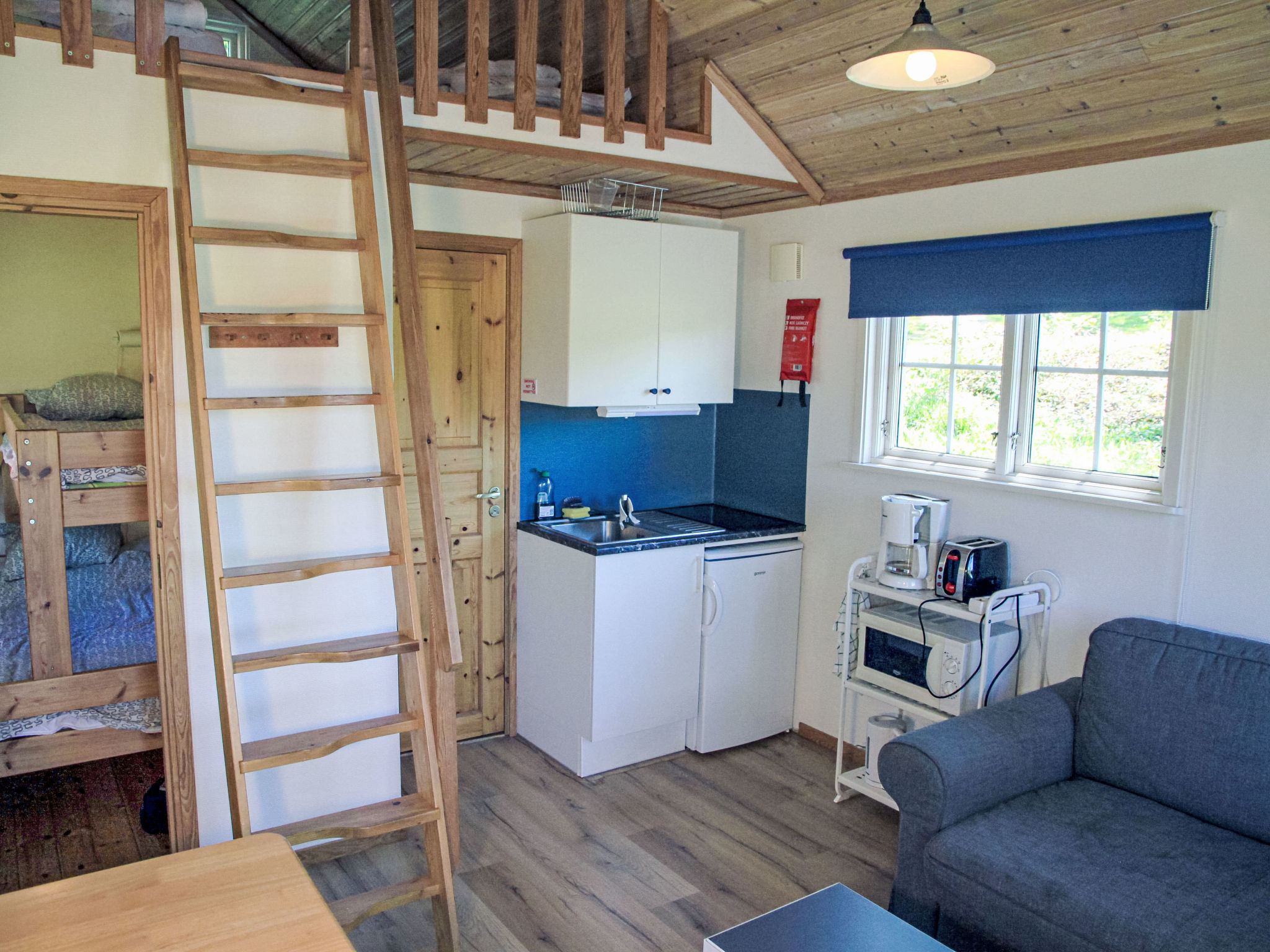 Holzhaus mit überdachter Terrasse