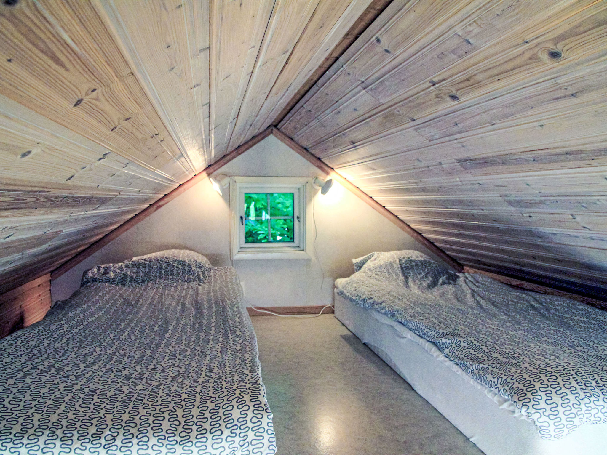Holzhaus mit überdachter Terrasse - Binnen