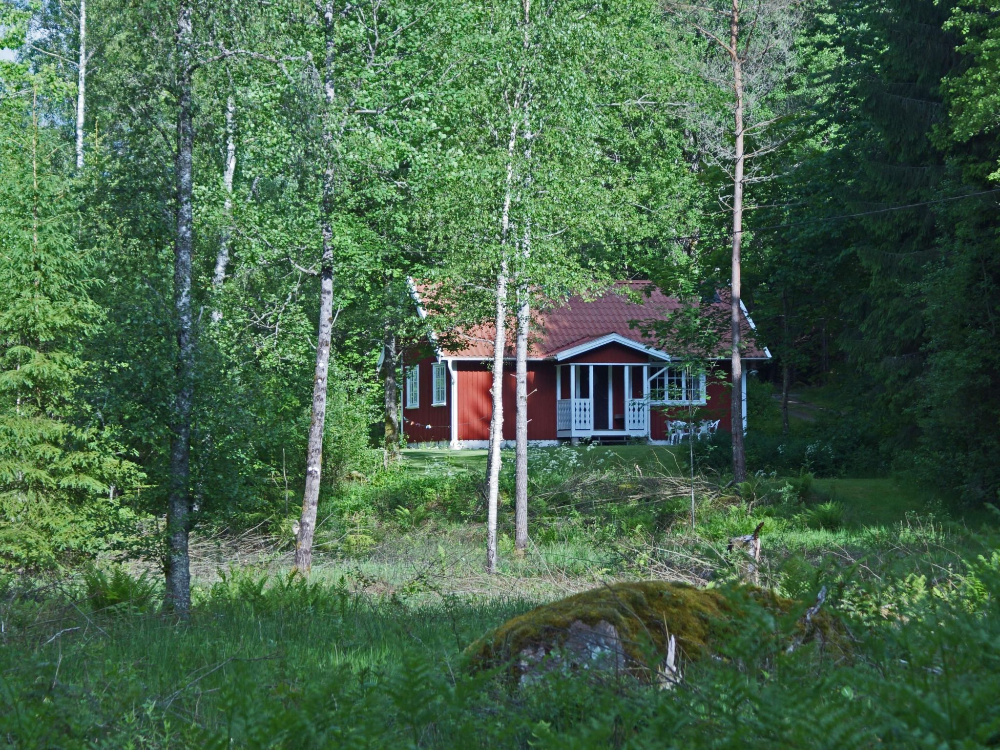 Gemütliches Holzhaus mit Boot - Outside