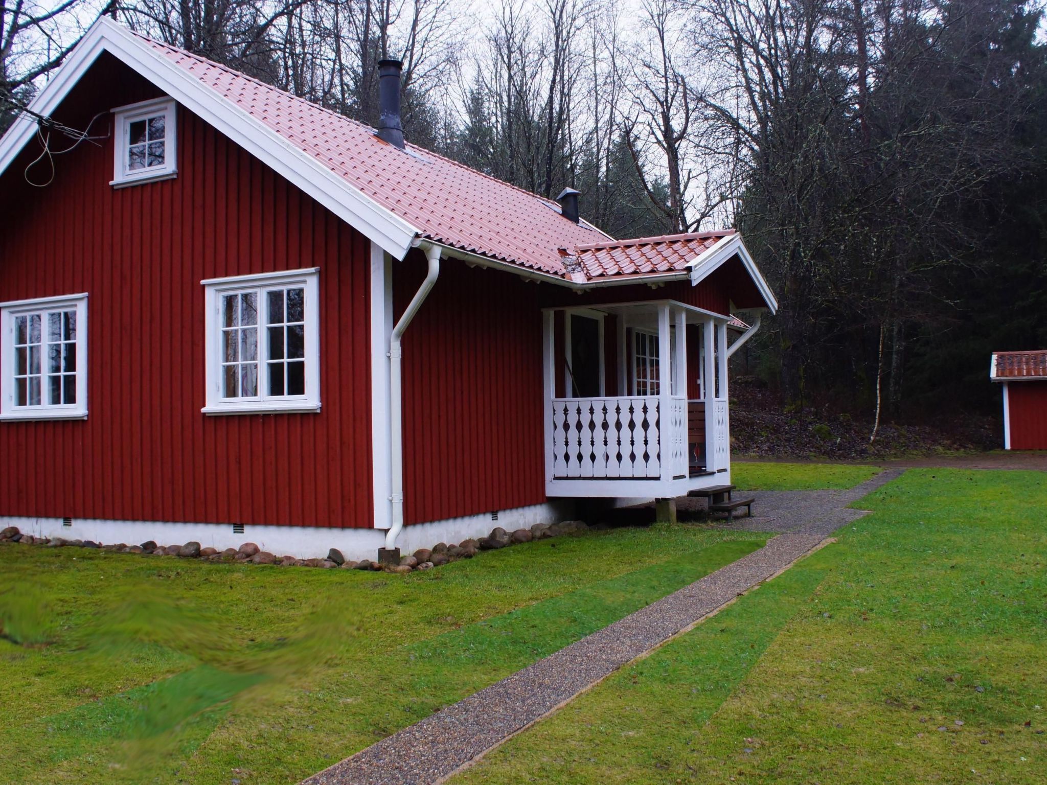 Gemütliches Holzhaus mit Boot - Outside