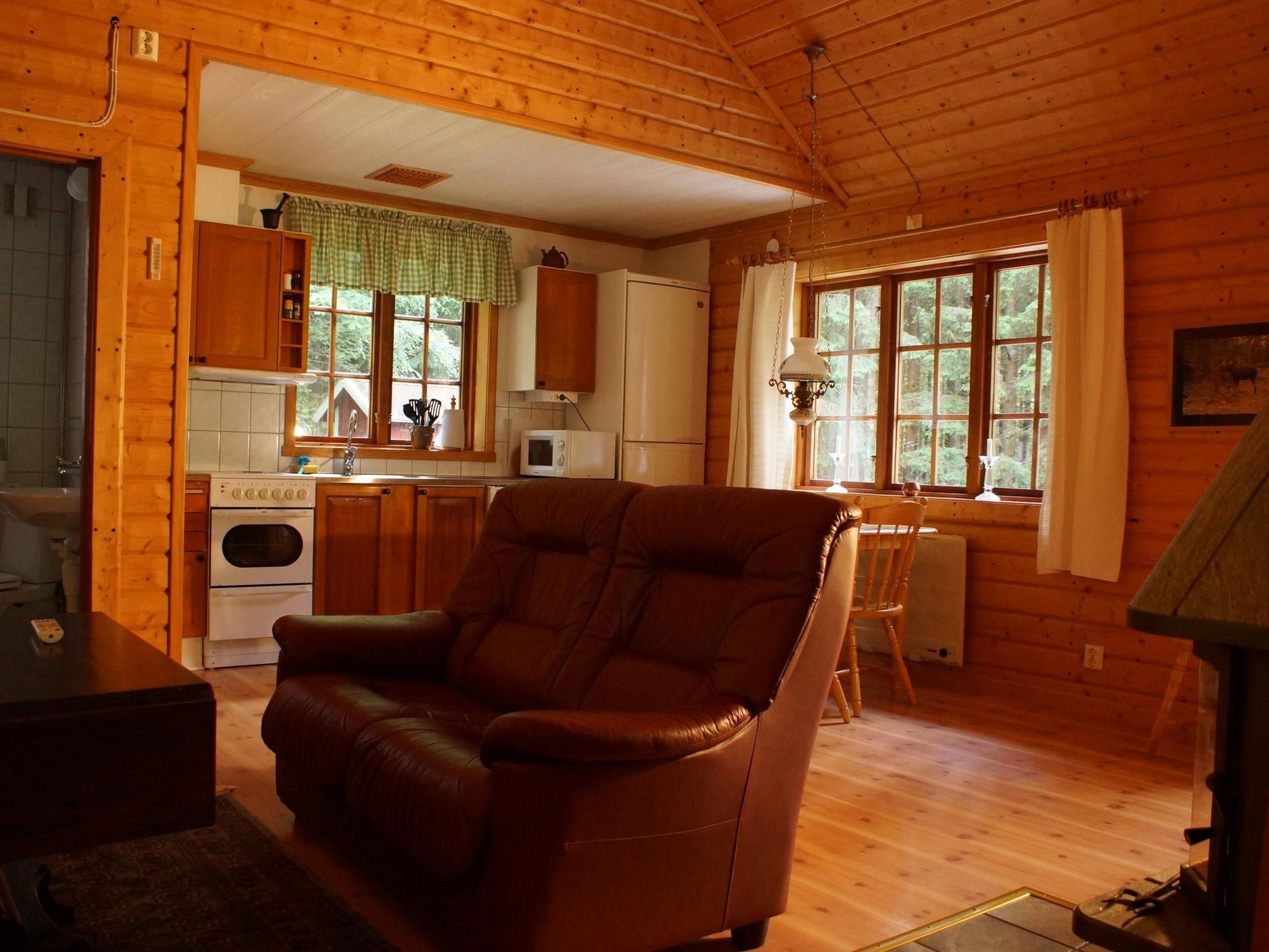 Gemütliches Holzhaus mit Boot - Inside
