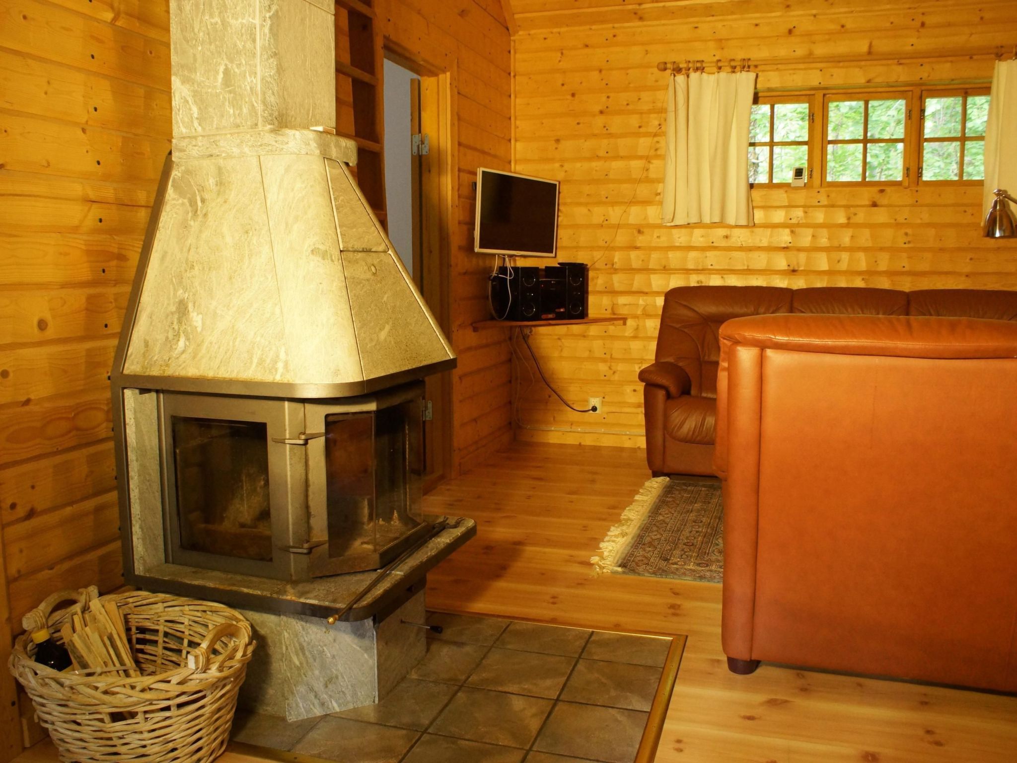 Gemütliches Holzhaus mit Boot - Inside