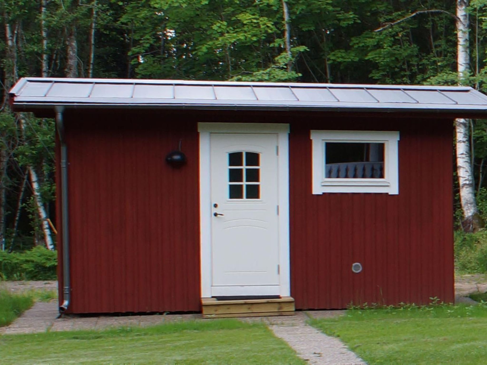 Gemütliches Holzhaus mit Boot - Outside