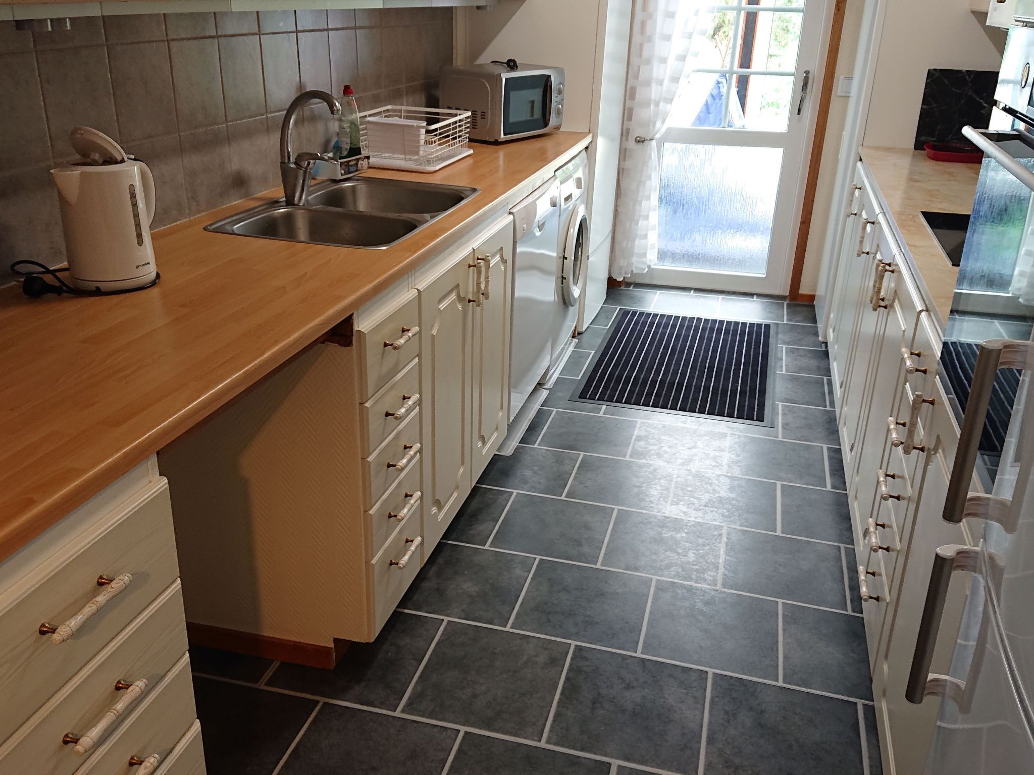 Familienfreundliches Ferienhaus mit großem Garten-Drinnen