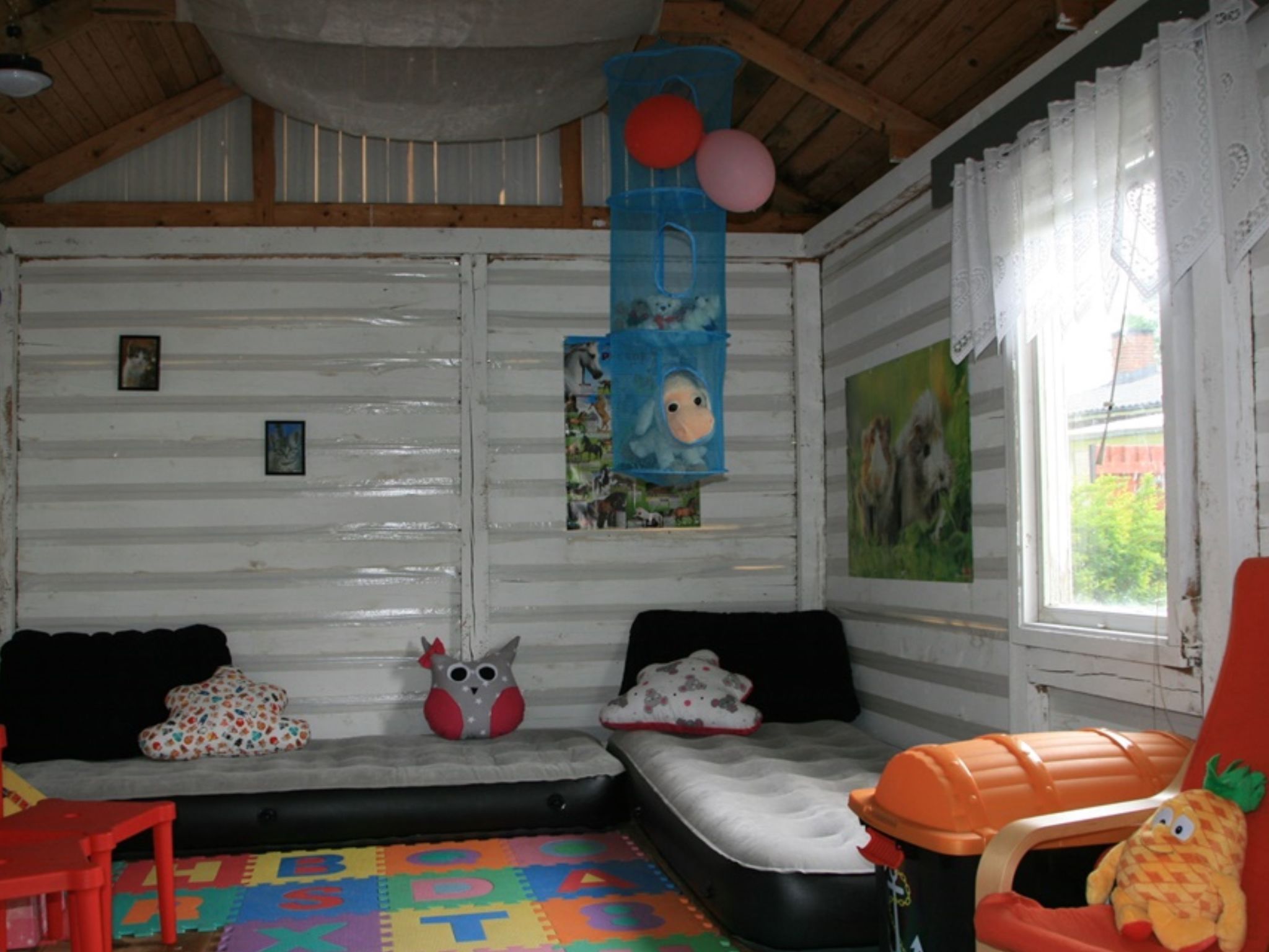 Familienfreundliches Ferienhaus mit großem Garten-Drinnen