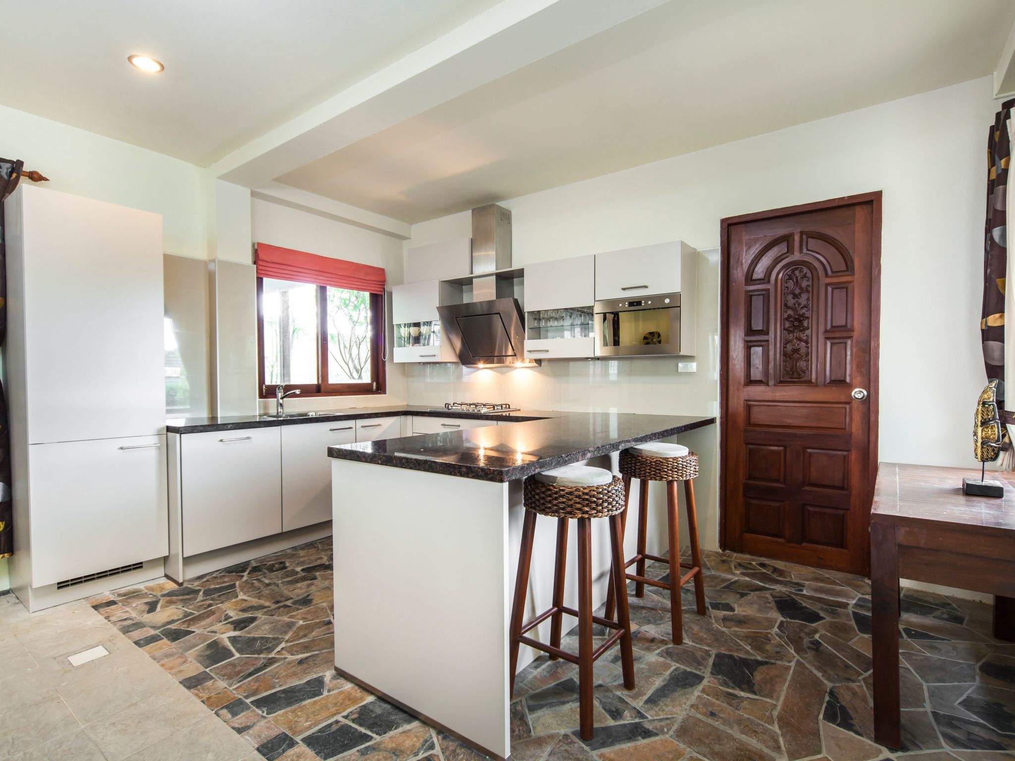 Photo of Ferienvilla mit Garten, Grill und Terrasse