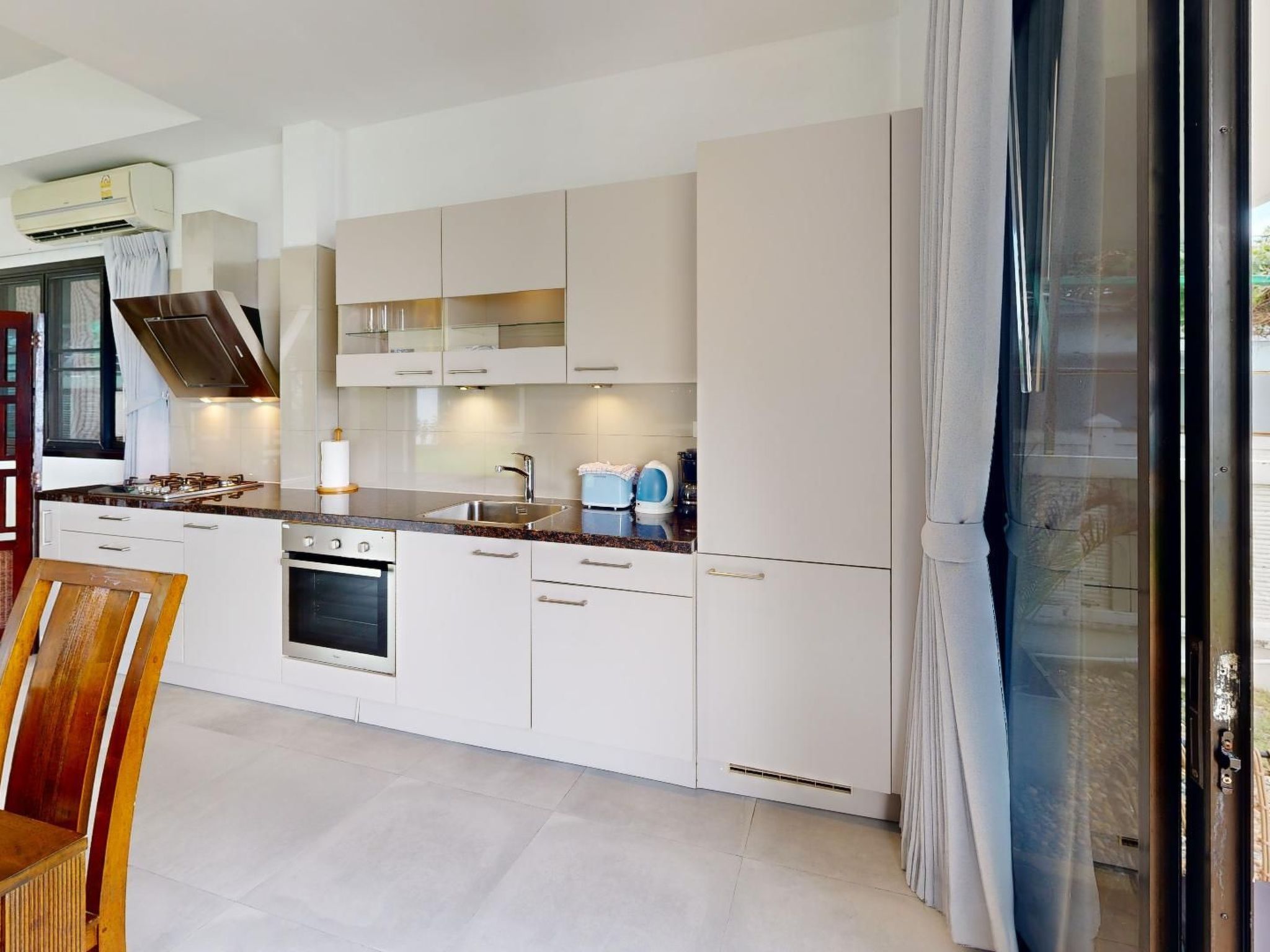 Photo of Ferienvilla mit Garten, Grill und Terrasse