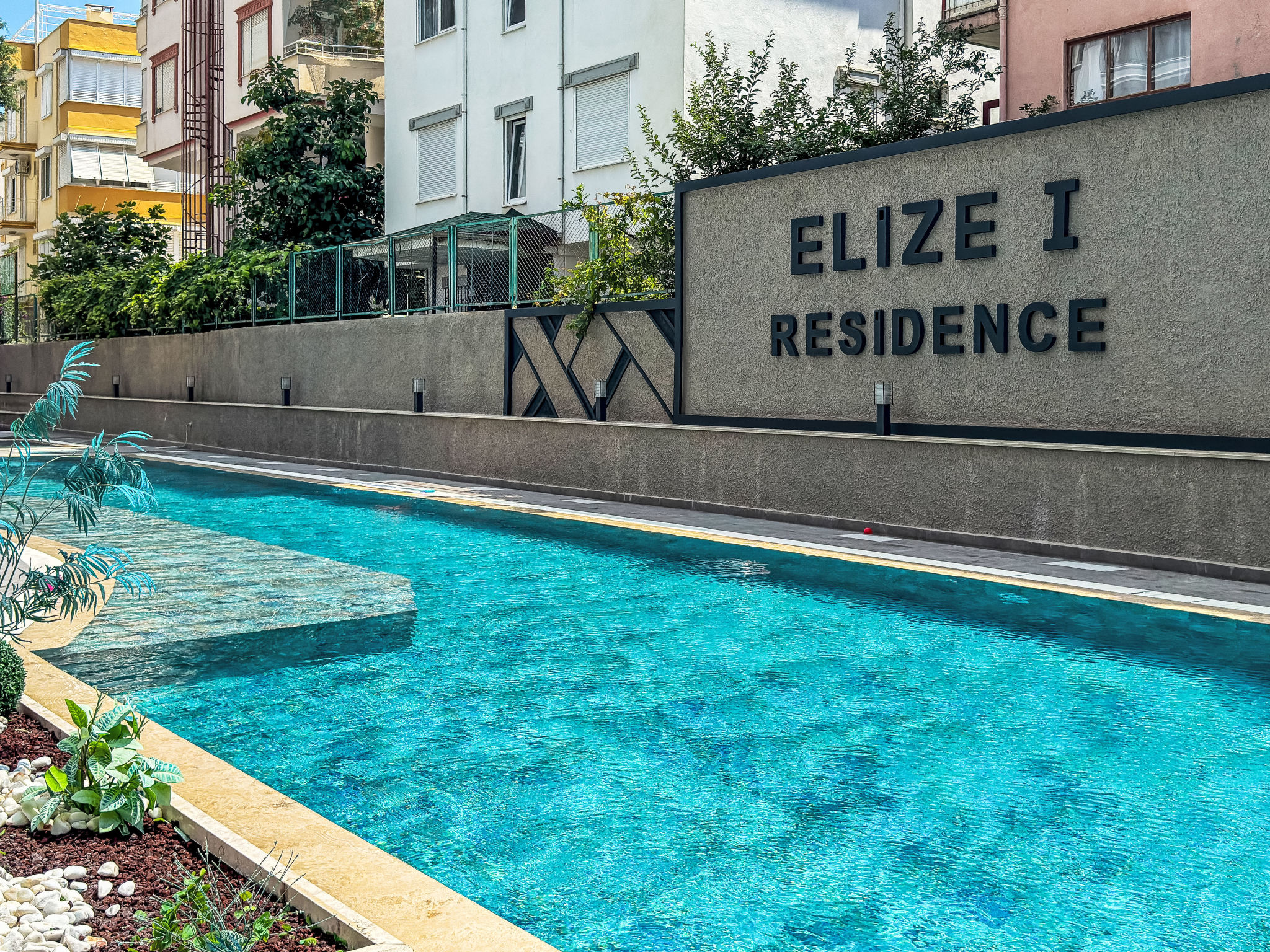 Appartement Qoople Elize B16 – Piscine extérieure, photo 7 sur 30