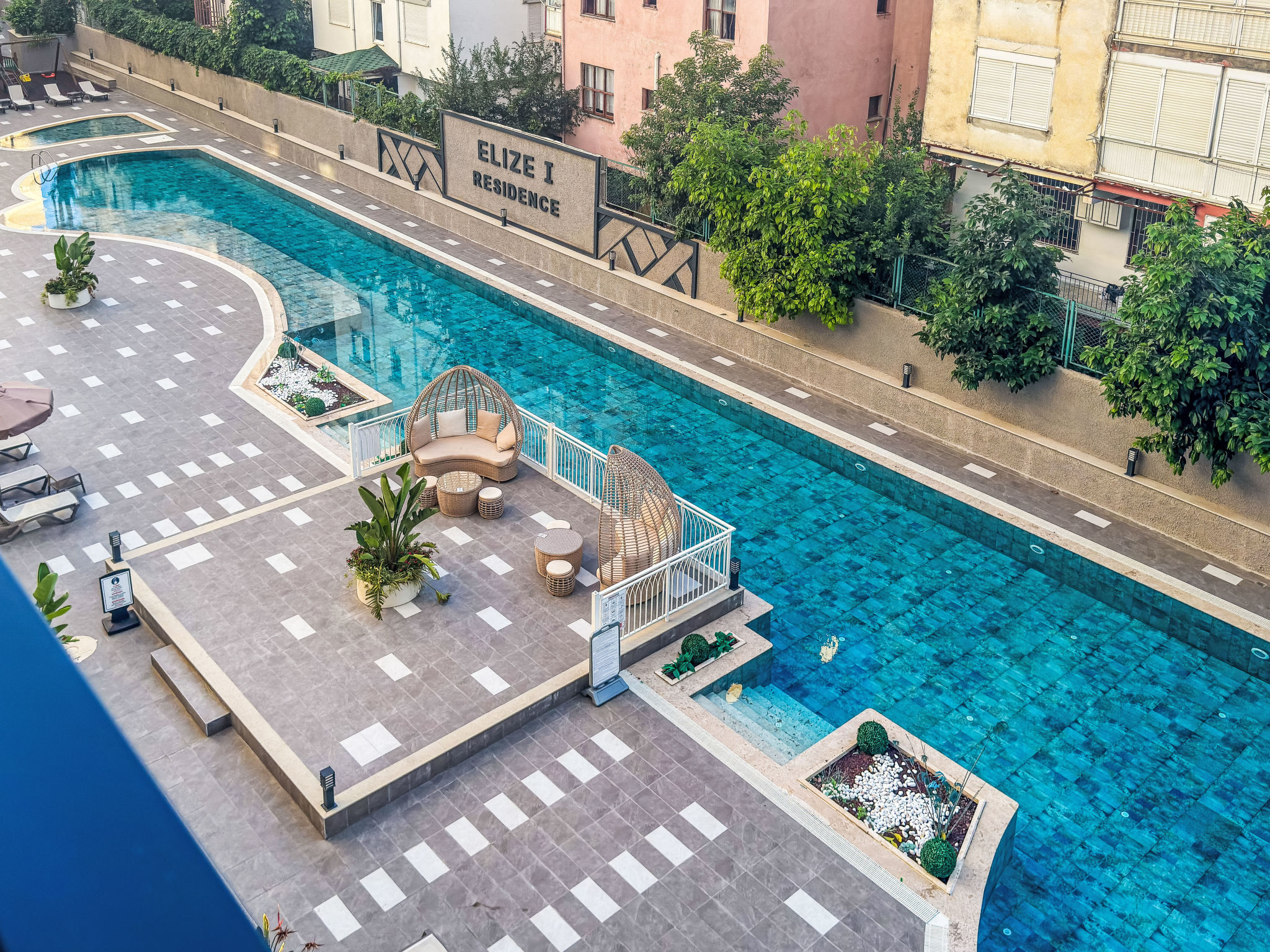 Appartement Qoople Elize B16 – Piscine extérieure, photo 25 sur 30