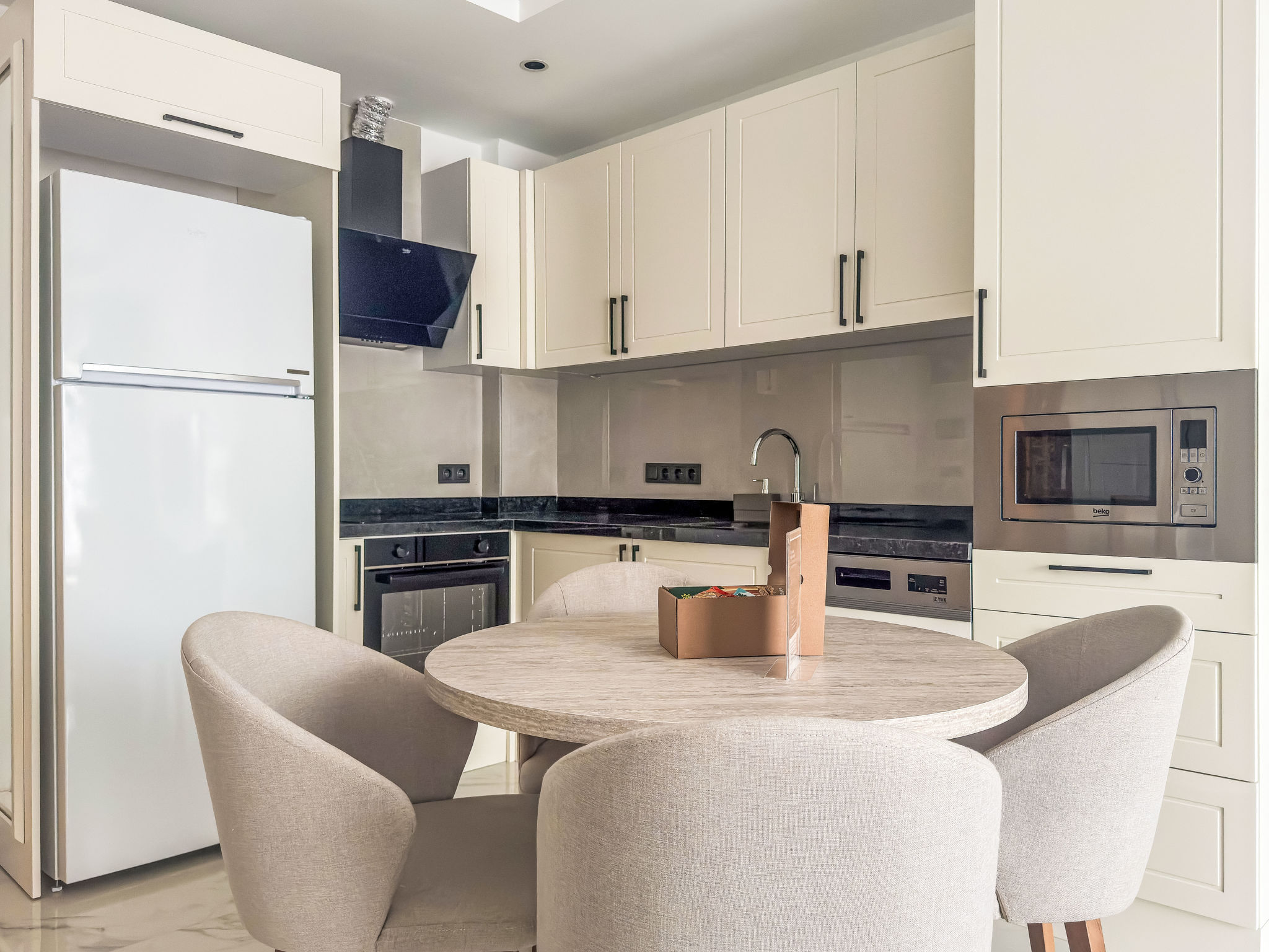 Appartement Qoople Elize B16 – Cuisine et coin repas, photo 28 sur 30
