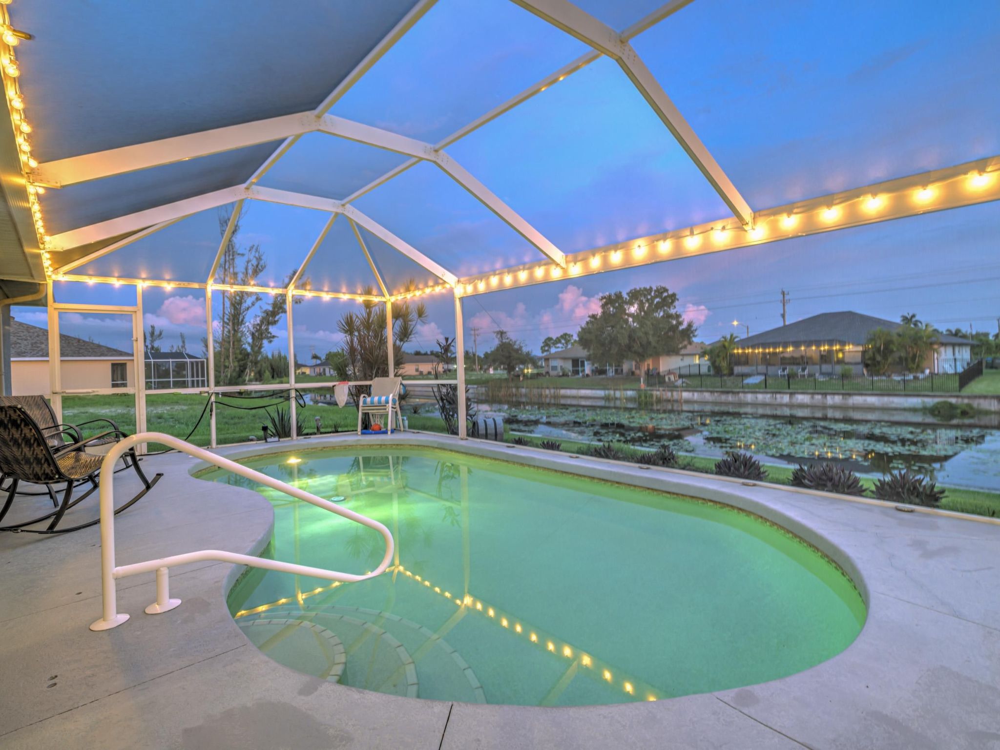 Discover the serene beauty of our holiday house located in the vibrant heart of SW Cape Coral, Florida. Perfect for a relaxing retreat, this charming getaway is idyllically positioned on an 80ft wide ..