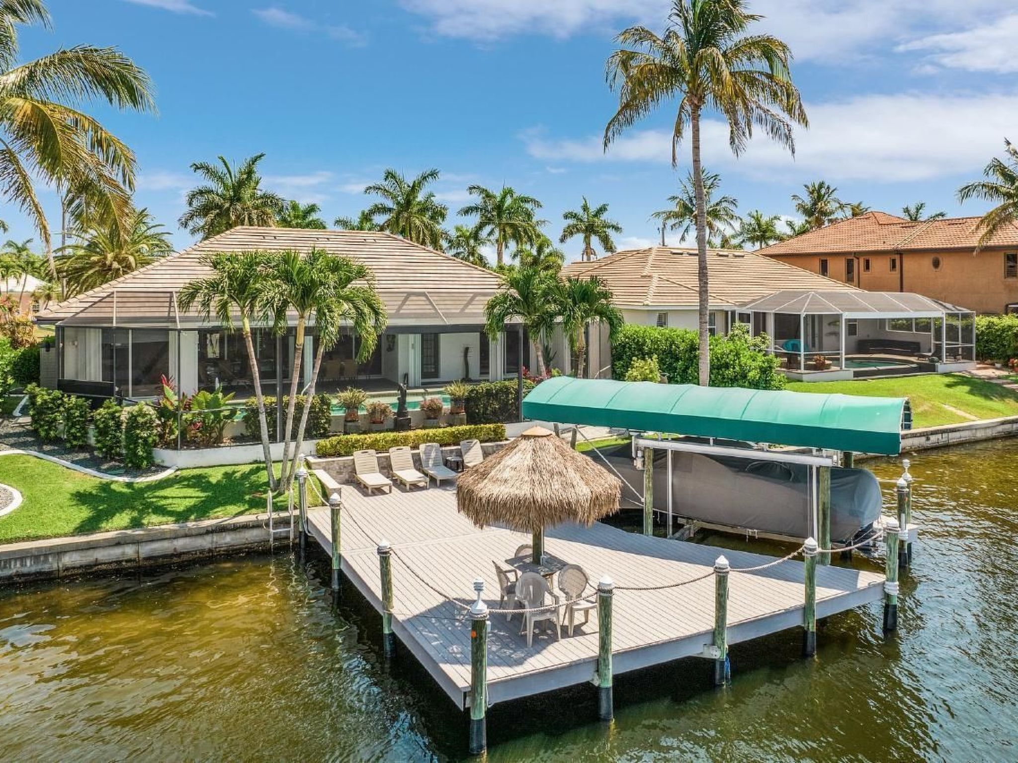 Close your eyes and imagine a place where sophisticated luxury meets tropical paradise. This stunning home in the exclusive South Cape, minutes from the prestigious Cape Harbor Marina, promises an unm..