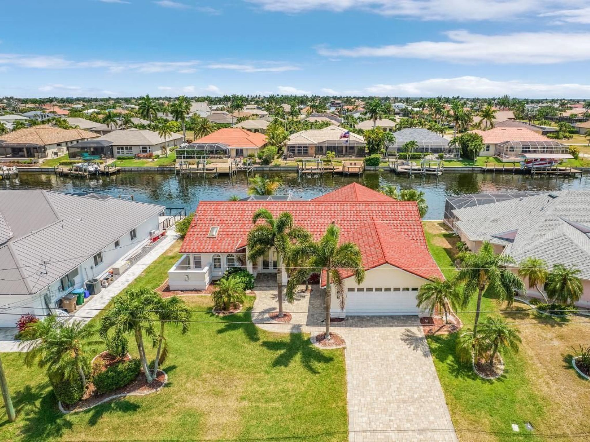 Escape to a world of coastal charm in this unparalleled SW Cape Coral location—a true paradise for fishing enthusiasts and boaters, where the promise of championship golf, stylish waterfront dining,..